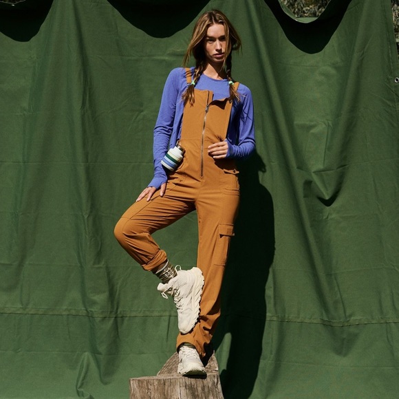 FP Movement by Free People Pants - NWT free people cascade one piece in amber.